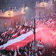 Nationalists streamover the Poniatowski Bridge in Warsaw.